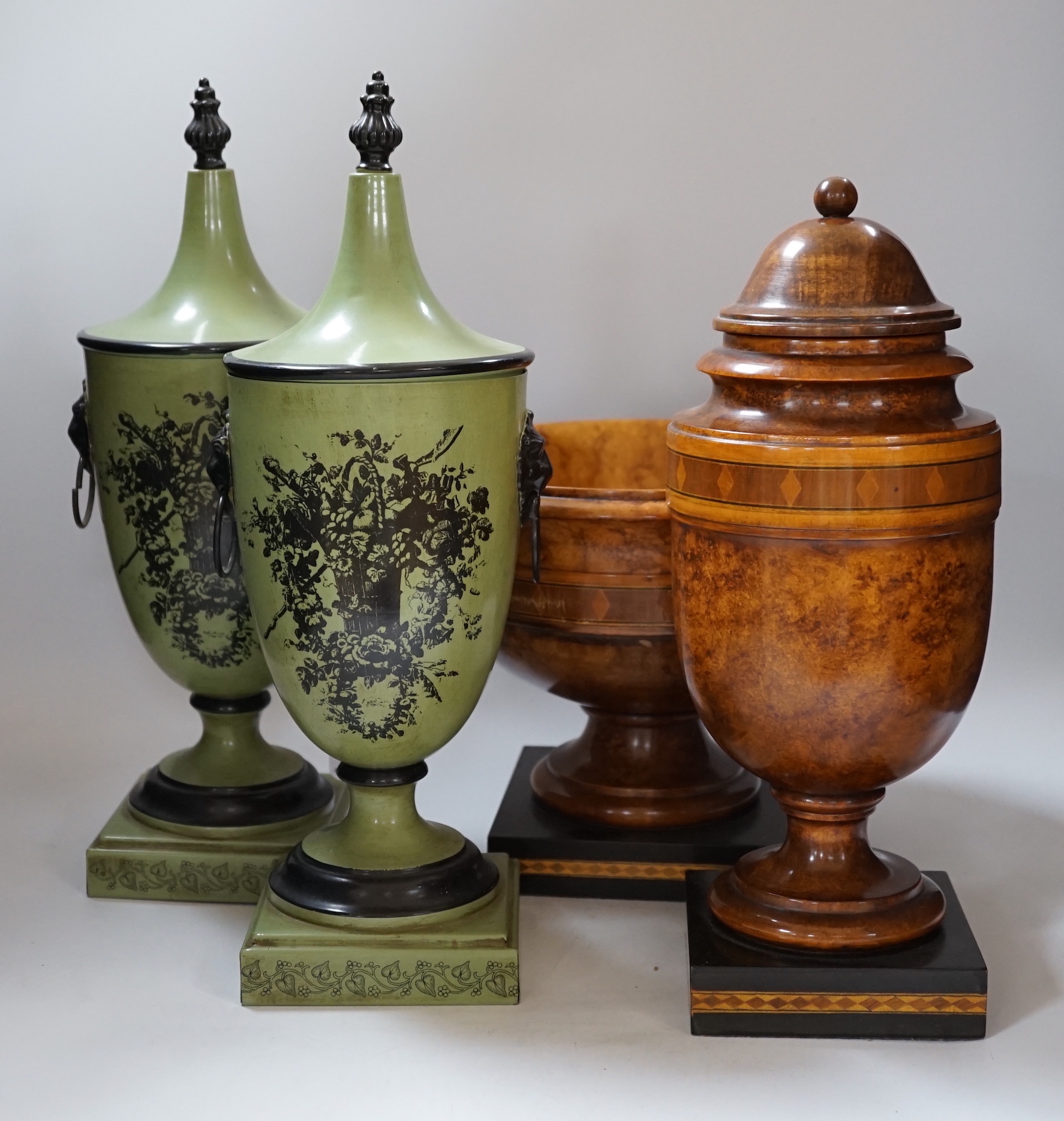 A pair of Toleware urns, a turned maple pedestal bowl and urn